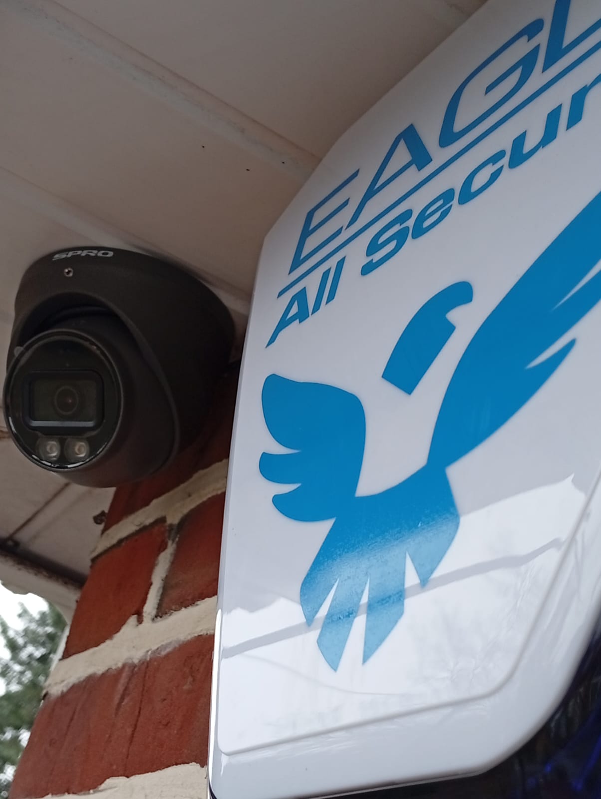 Commercial CCTV camera and alarm bellbox providing visible security deterrence