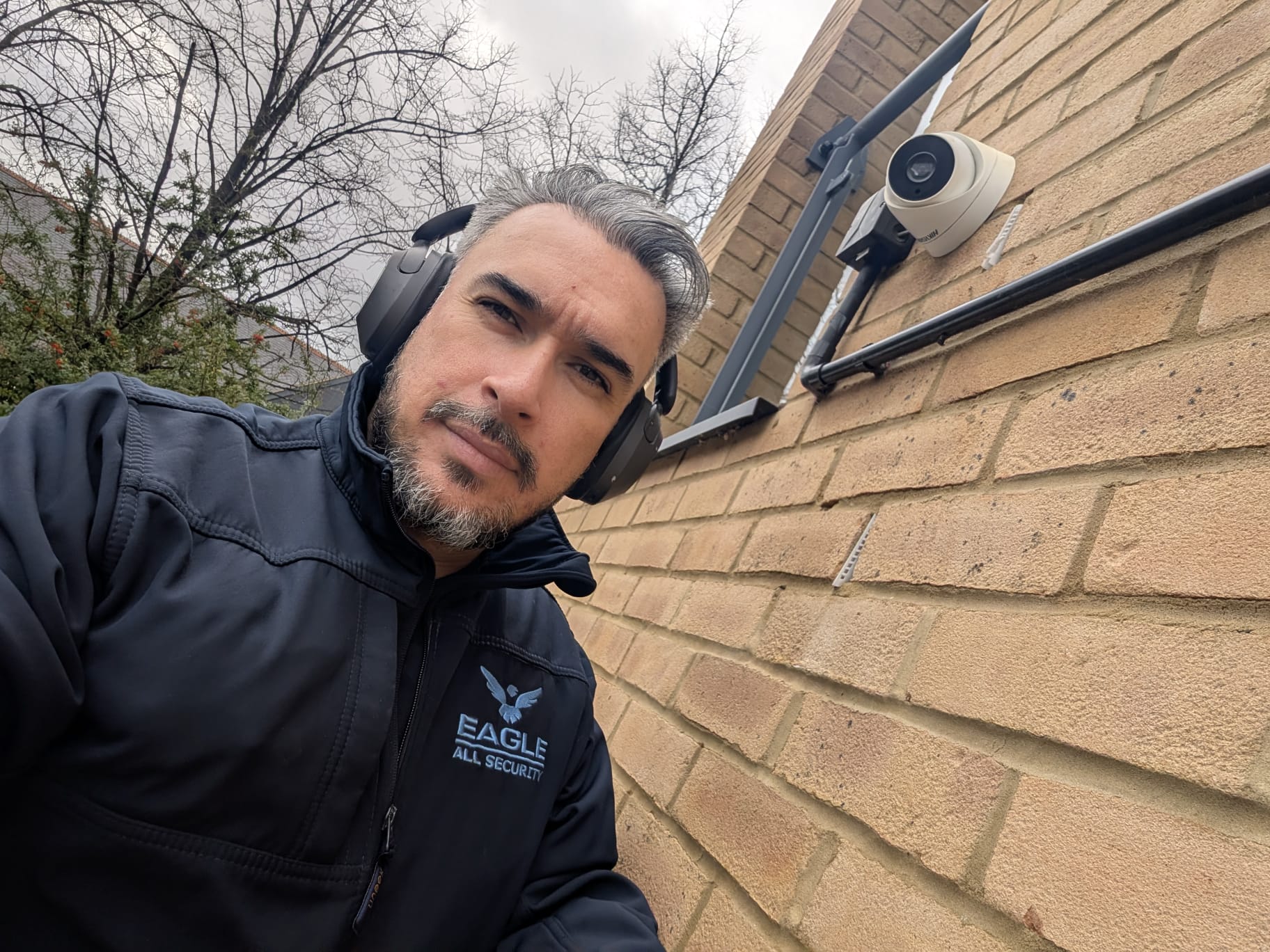 Eagle All Security engineer installing CCTV camera on a London property
